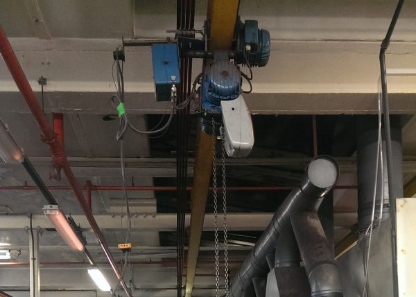 Bespoke monorail hoisting system with an automated vertical oscillation element